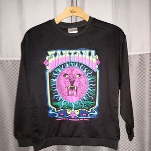 Woman's black Carlos Santana graphic sweatshirt